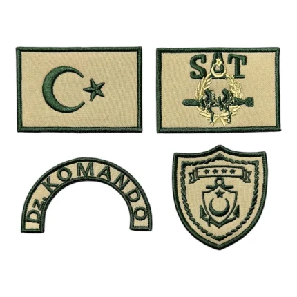 tan colored background sat commando patch set