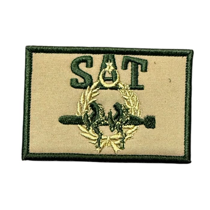 tan color background green sat logo patch