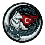 wolf and crescent patch on the red apple road